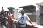 Not only did I find Fab, but he was kind enough to take this shot of yours truly enjoying himself immensely in the sun in the pitlane.  (Note the bumbag which I NEVER take off, Martyn......!)   