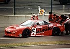 Here we see the Kunimitsu Honda 84 of Tsuchiya, Iida and team boss Kunimitzu Takahashi being pushed out of the pit lane before joining the echelon ranks in front of the pits.  