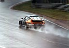 Leaving plenty of spray in it's wake, the 91 Porsche (in those familiar Repsol colours) was driven by Saldana, D'Orleans and De Castro. This car was one of a number to end it's days in an accident in the Porsche Curves.