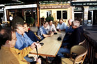 The team settle in for breakfast at the Bar La Bisquine in Honfleur on Friday morning.  L-R:  Mark, Pierre, Clive, Robert, Martin, Ian, Jeff, Alan and Jim.