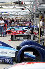 A view along the crowded pitlane....