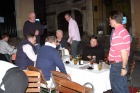 The rest of the Tourists are about to leave the table - Peter and Duncan (sitting on left), Jeff, Nick, John, Jeremy and Mark.  (Brian is behind Mark).  