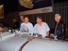 Alan, Martyn, Ian and Jim listen to the history of the car from the driver