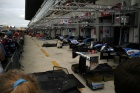 The first view up the pitlane from the Peugeot pits