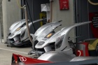 The controversial Audi nose sections lined up in front of the pits.