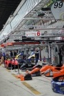 Another view up the pitlane from the Peugeot pits.
