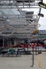 The work continued up and down the pitlane to ready the cars for the race tomorrow
