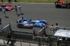 The cars are now taking up their places on the dummy grid, 33, 4 and 12 await the final pace car lap....