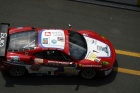 The #81 Ferrari leaves the pits again
