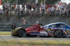 Nicolas Lapierre slices inside the #70 Porsche in his Oreca