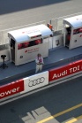 Bruce Jones of Radio Le Mans watches the action in the Audi pit