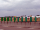 The view from the road, looking across the airport to the circuit.  To the left, the Dunlop Bridge and the yellow Dunlop Grandstand.....